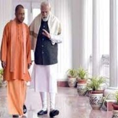 Yogi Adityanath shares picture with PM Modi